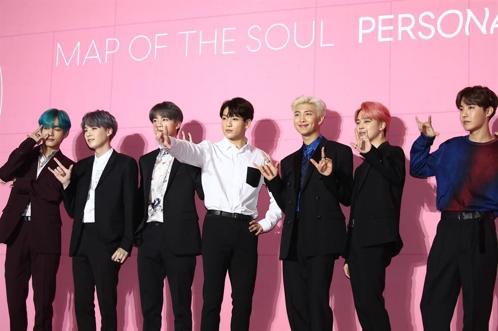 BTS members joking around during the global press conference for Map of the Soul: Persona at Dongdaemun Design Plaza in Seoul, April 2019