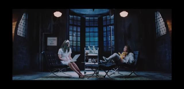 BLACKPINK Jennie in a red diner scene from the Lovesick Girls music video set