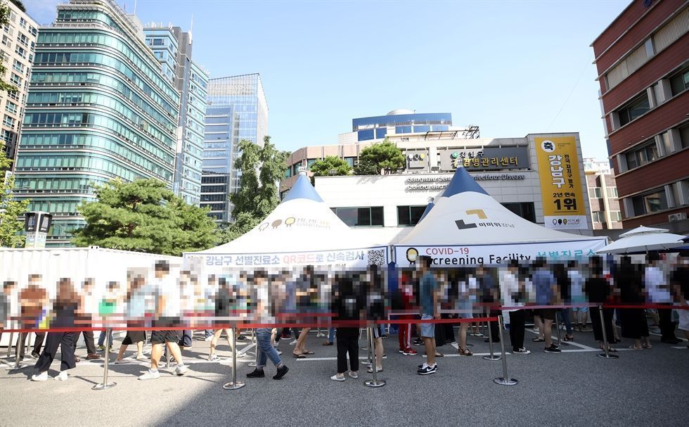 New cases over 2,000 for 2nd day; virus curbs extended for 2 weeks ...