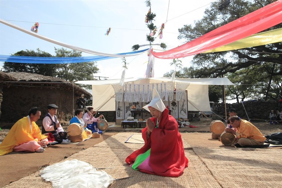 Traditional Korean folk ritual scene illustrating the rich background of Korean superstitions and beliefs
