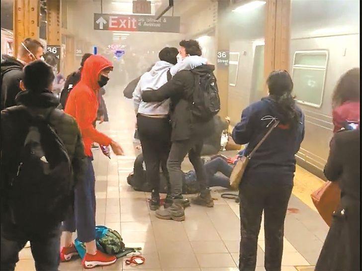 Manhunt under way for gunman in NYC subway shooting that injured at ...