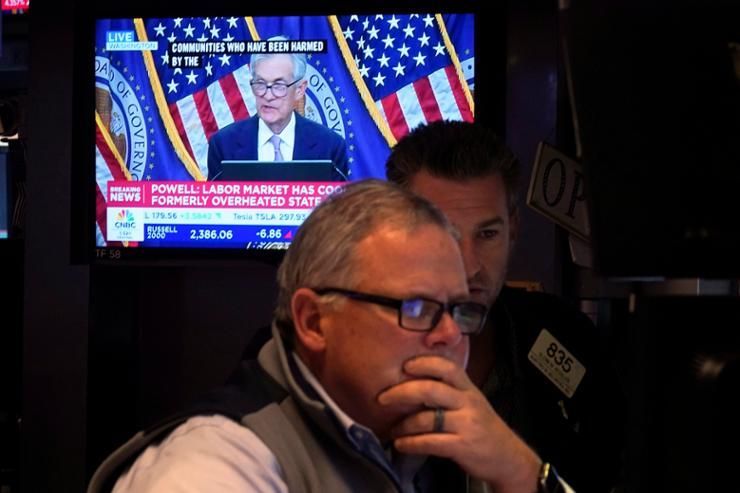 Most of Wall Street rises after Fed cuts interest rates