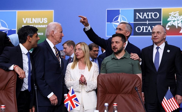 NATO allies offer Ukraine security assurances as Biden hits out at ...