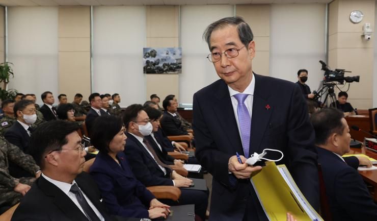 Police question impeached PM again over martial law bid
