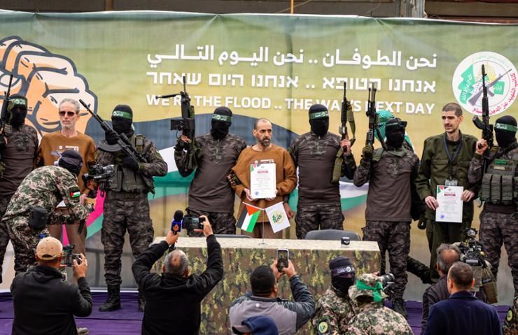 Hamas says it will delay release of more hostages, putting Gaza ceasefire at risk