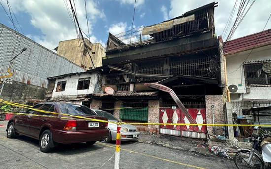 Fire kills 8 in the Philippines after flames gutted a residential building in less than an hour