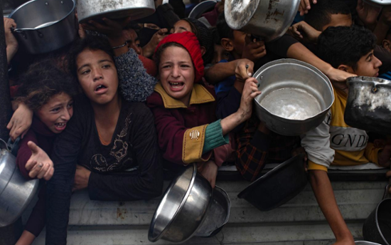 UN says it is halting aid deliveries through main Gaza crossing because the route is too dangerous