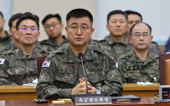 Prosecutors seek arrest warrant for ex-martial law commander