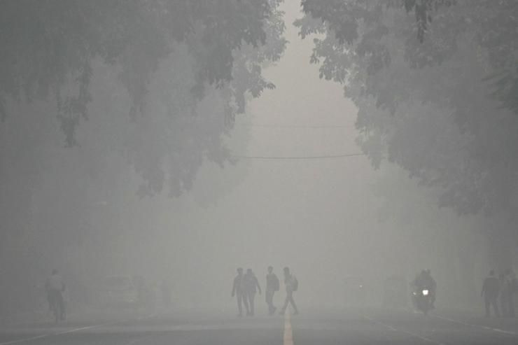 India's capital shuts schools as 'death trap' smog chokes city