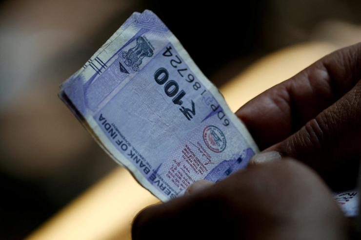 Investors eye Fed policy, US tariff news for India rupee, bond moves