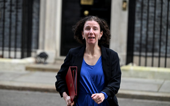 UK's international development minister quits after foreign aid cut