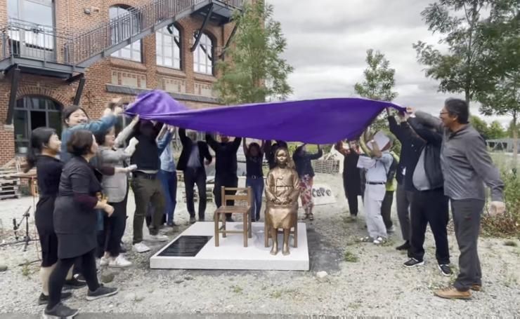 Girl statue removed from German university to be reinstalled on Women's Day