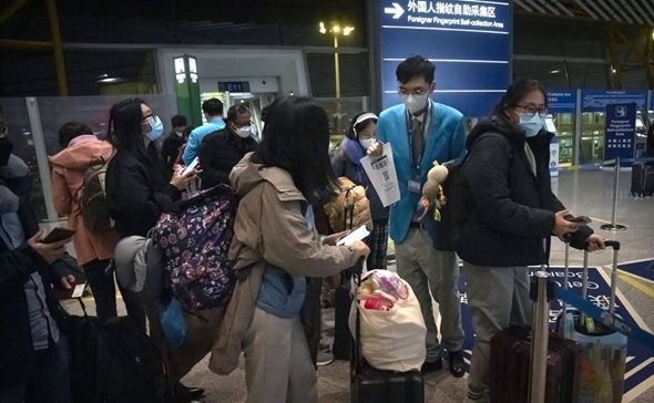 China halts short-term visas in Korea, first response to COVID curbs ...