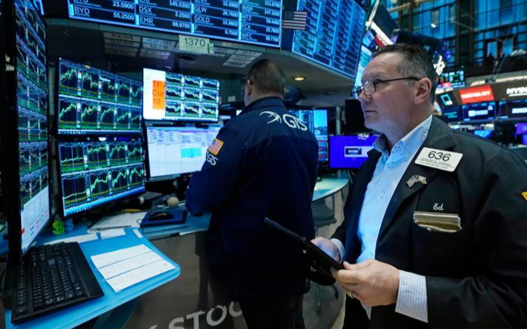 Wall Street advances as Fed keeps rates steady; Powell sounds less hawkish - Vimarsana News